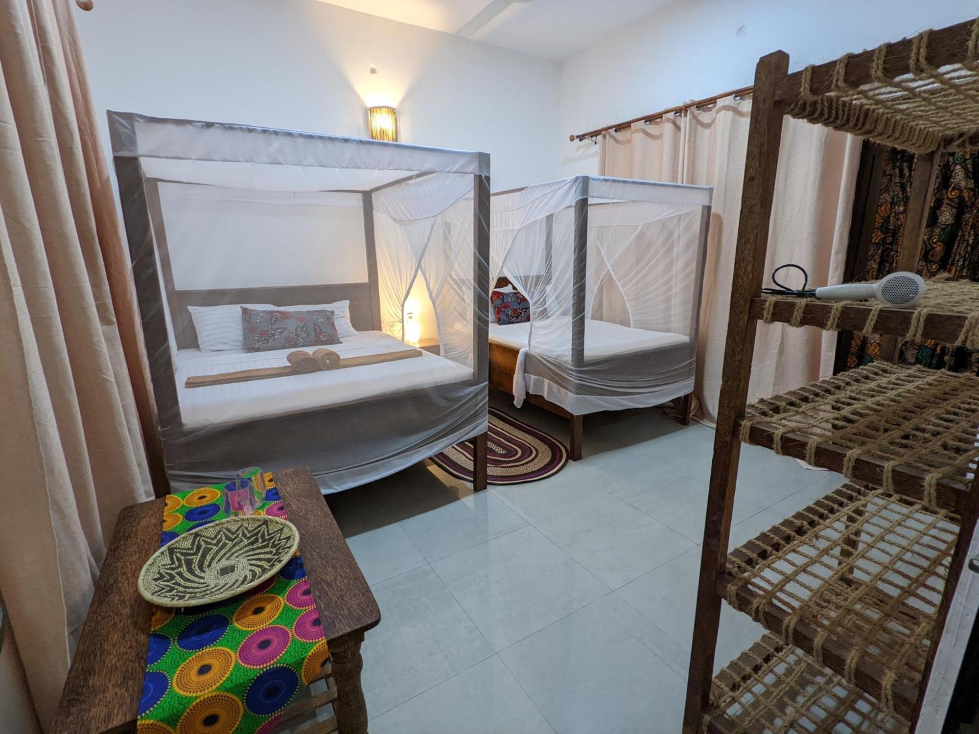 Mkadi Beach House Otel Nungwi Oda fotoğraf