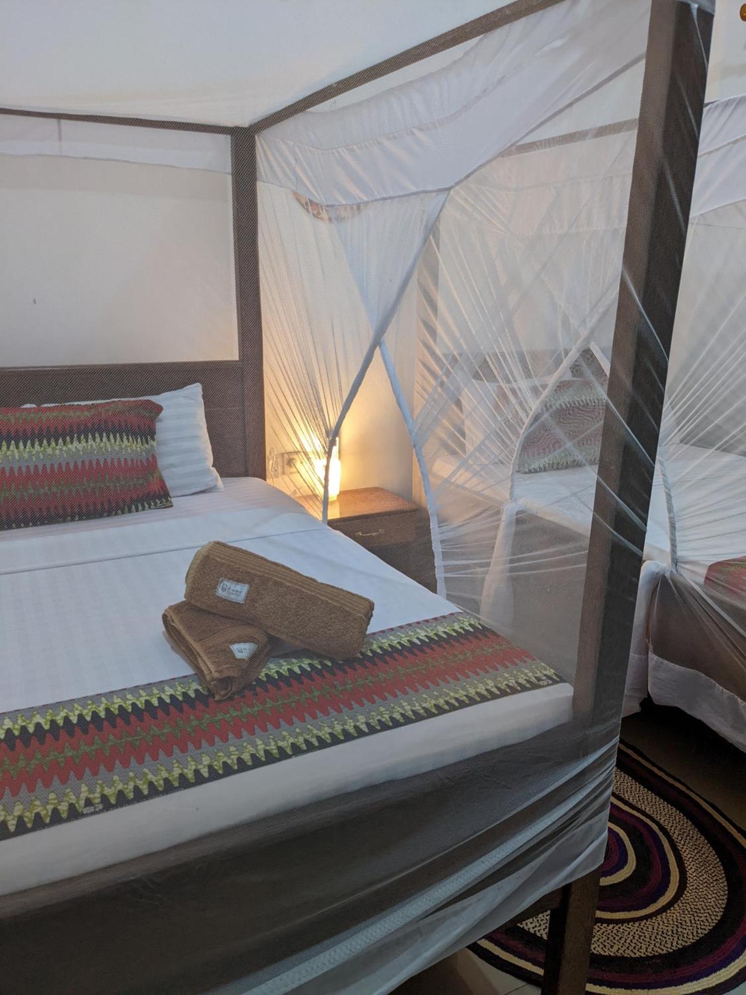 Mkadi Beach House Otel Nungwi Oda fotoğraf